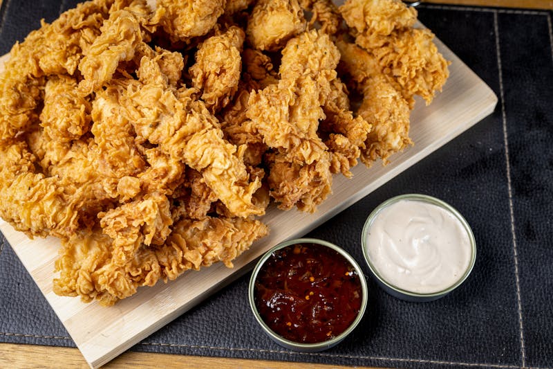 Crispy seasoned waffle fries with dipping sauce
