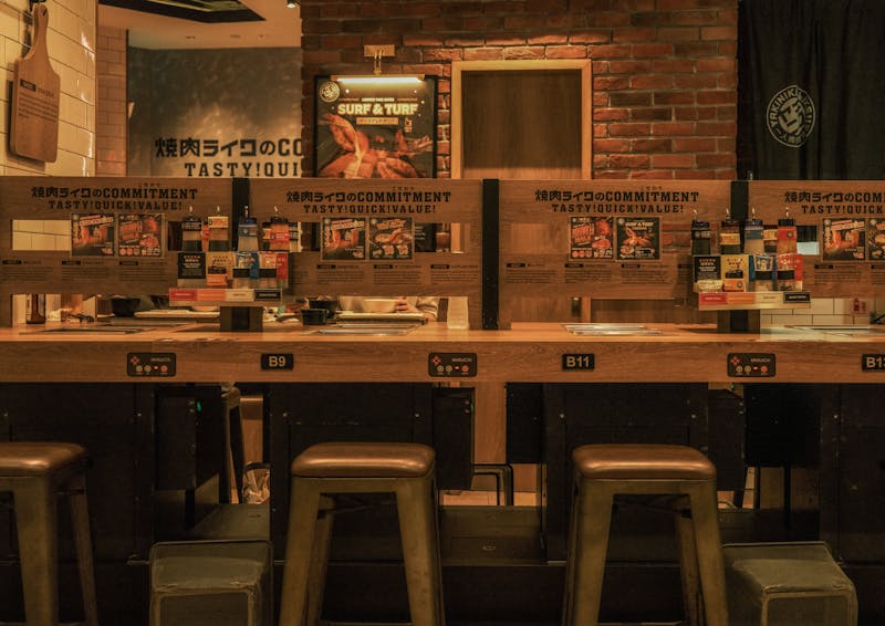 Casual seating area with warm lighting at East Coast Wings